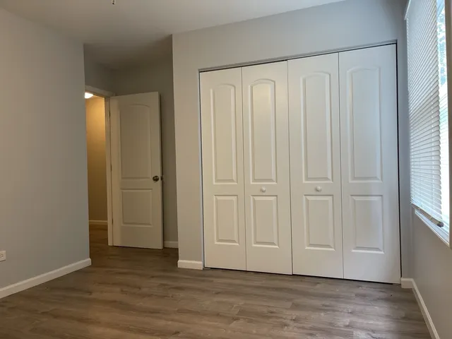 a view of a livingroom with wooden floor