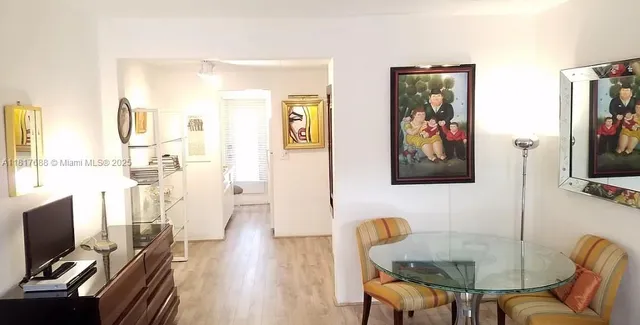 a workspace with furniture and a flat screen tv