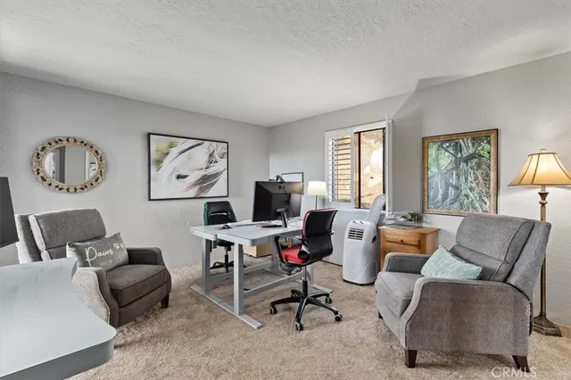 a balcony with view of balcony with wooden floor and fence