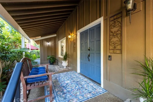 a view of walk in closet with white walls