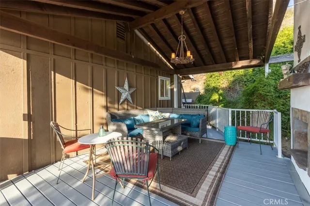 a view of a pathway with a wrought fence