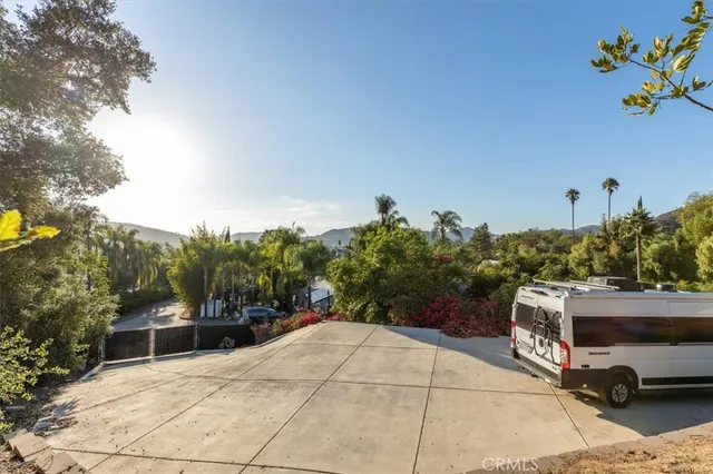 a view of a lake with mountains in the background