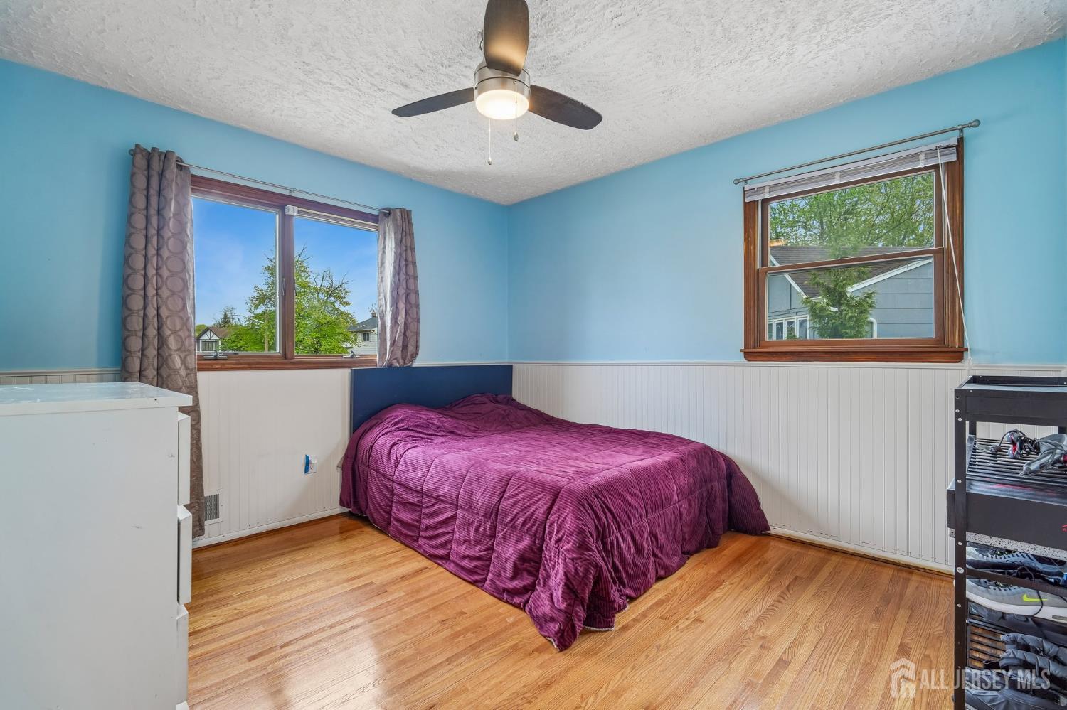 2 Marc Court Edison, NJ 08820 - Photo 21 of 23 a bedroom with a bed and a dresser next to a window