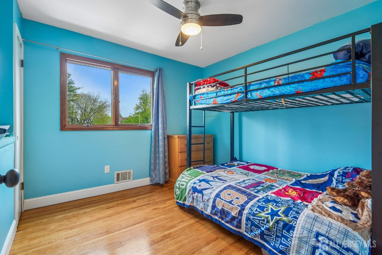 2 Marc Court Edison, NJ 08820 - Photo 22 of 23 a bedroom with a bed and a chandelier