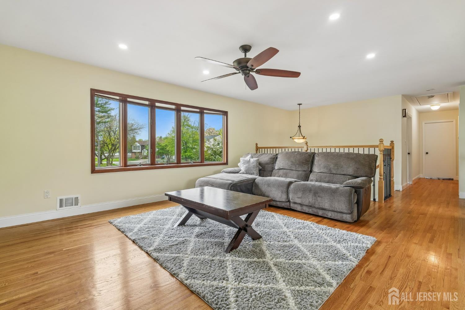 2 Marc Court Edison, NJ 08820 - Photo 3 of 23 a living room with furniture and a large window