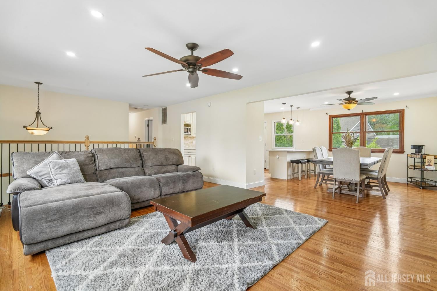 2 Marc Court Edison, NJ 08820 - Photo 5 of 23 a living room with furniture and a wooden floor