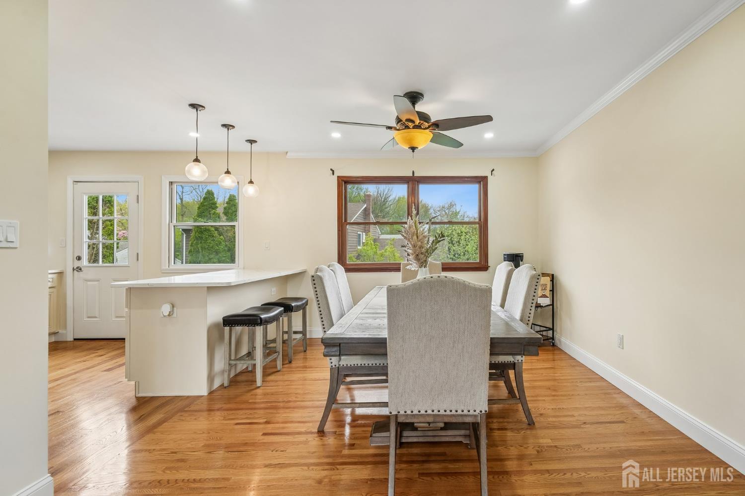 2 Marc Court Edison, NJ 08820 - Photo 7 of 23 a view of a dining room with furniture a chandelier and wooden floor