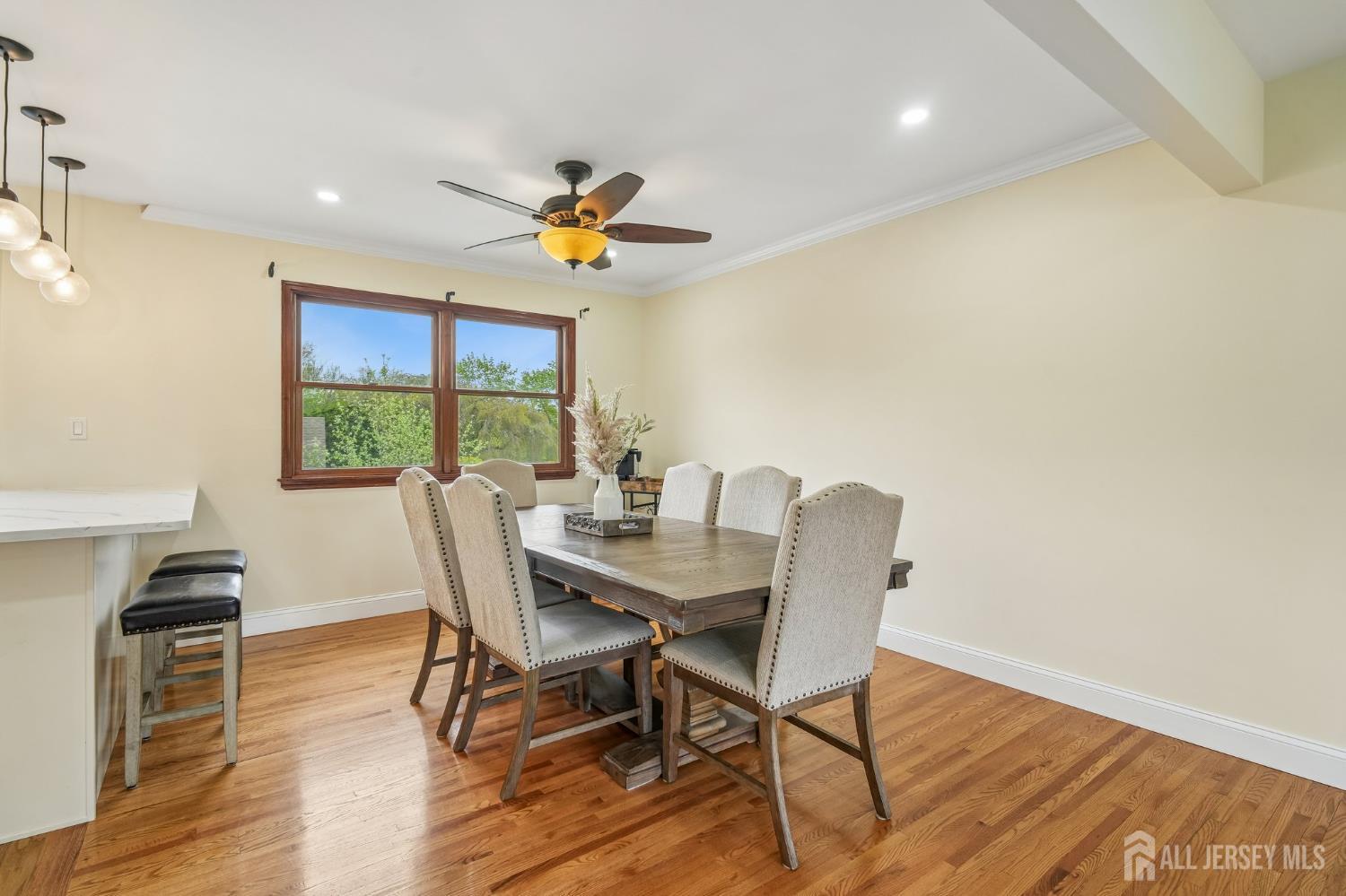 2 Marc Court Edison, NJ 08820 - Photo 8 of 23 a view of a dining room with furniture and wooden floor