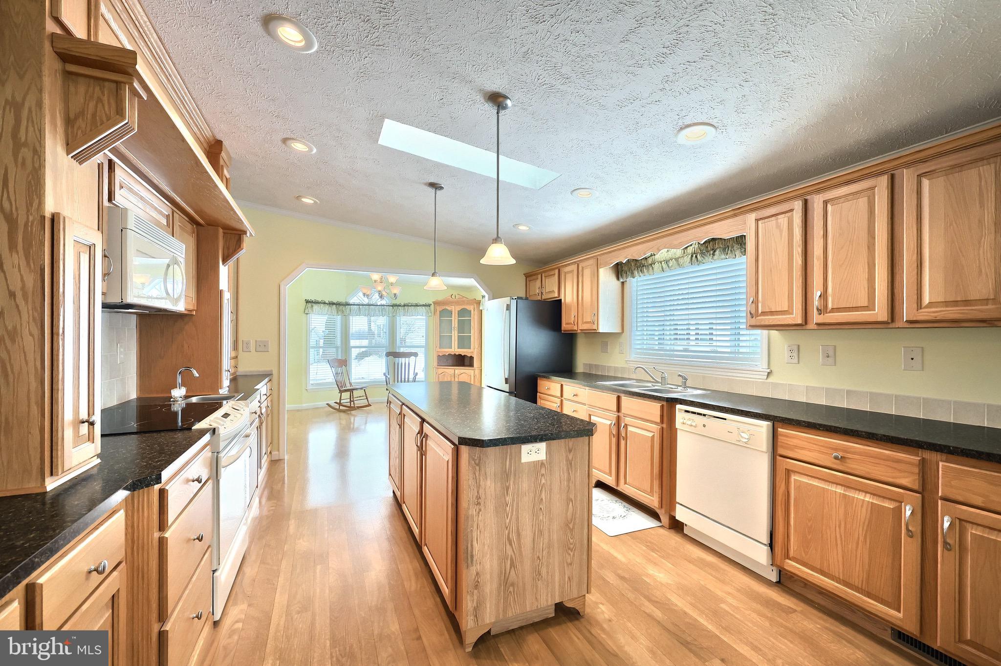 267 Runaway Road Abbottstown, PA 17301 - Photo 11 of 38 a kitchen with counter top space and wooden floor