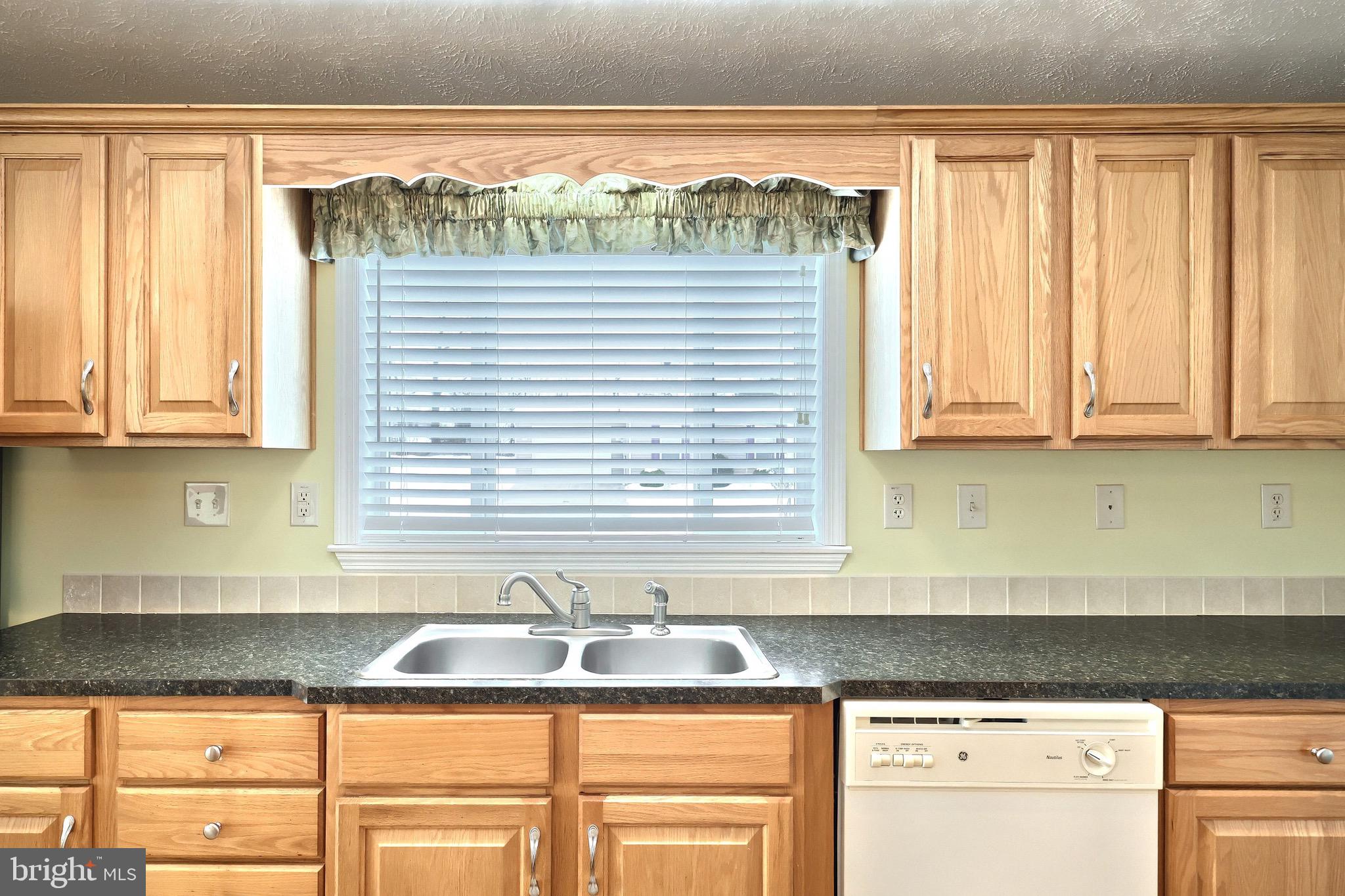 267 Runaway Road Abbottstown, PA 17301 - Photo 13 of 38 a kitchen with a sink and a window