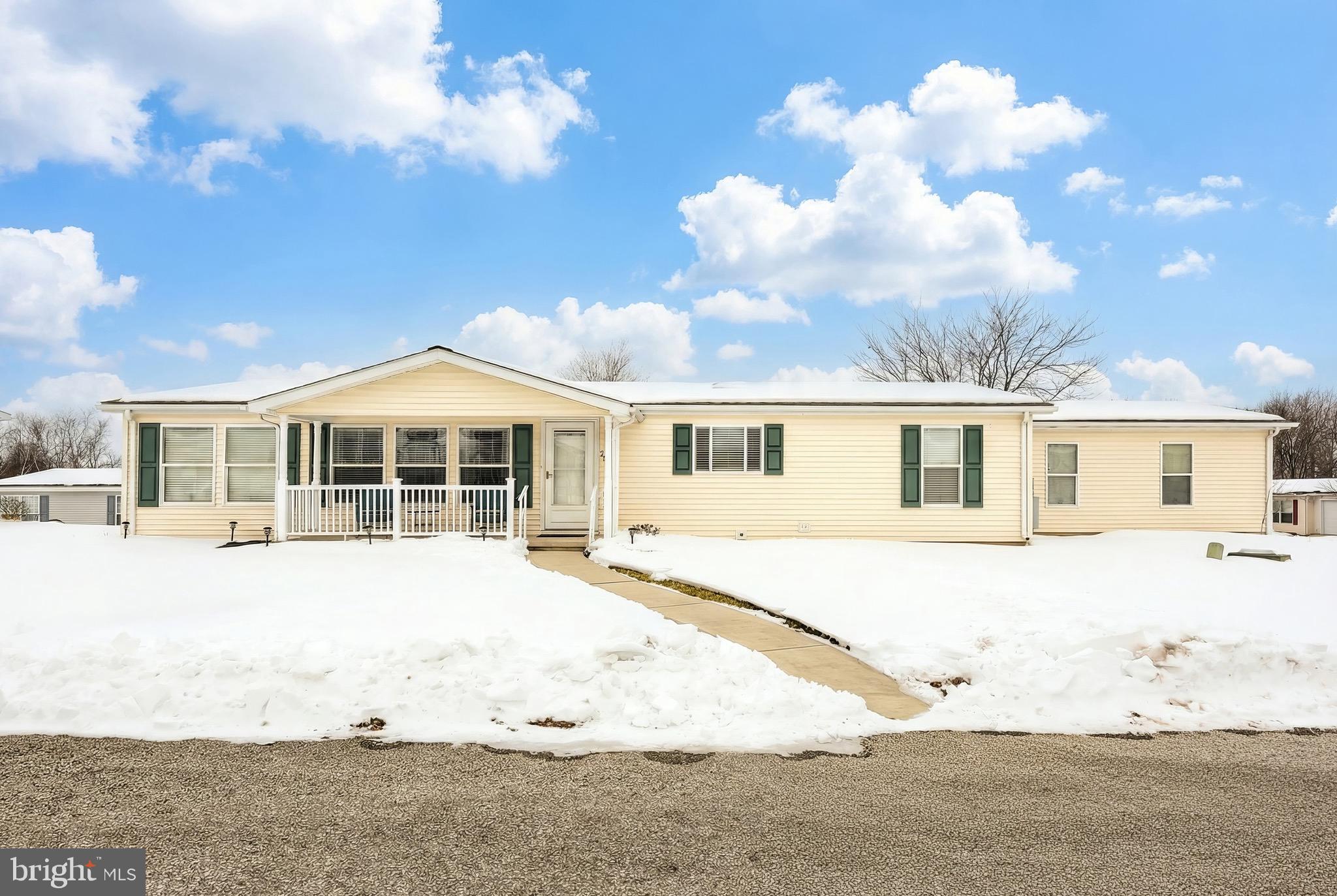 267 Runaway Road Abbottstown, PA 17301 - Photo 2 of 38 a front view of a house with a yard