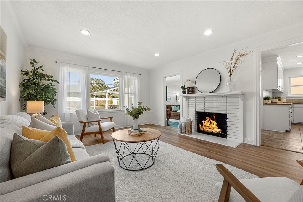 907 Chestnut Avenue Brea, CA 92821 - Photo 1 of 35 a living room with furniture and a fireplace