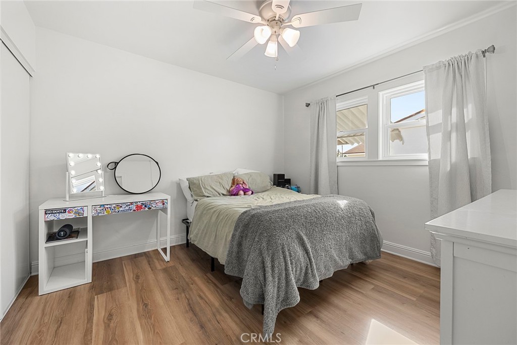 907 Chestnut Avenue Brea, CA 92821 - Photo 16 of 35 a spacious bedroom with a bed and a cabinets