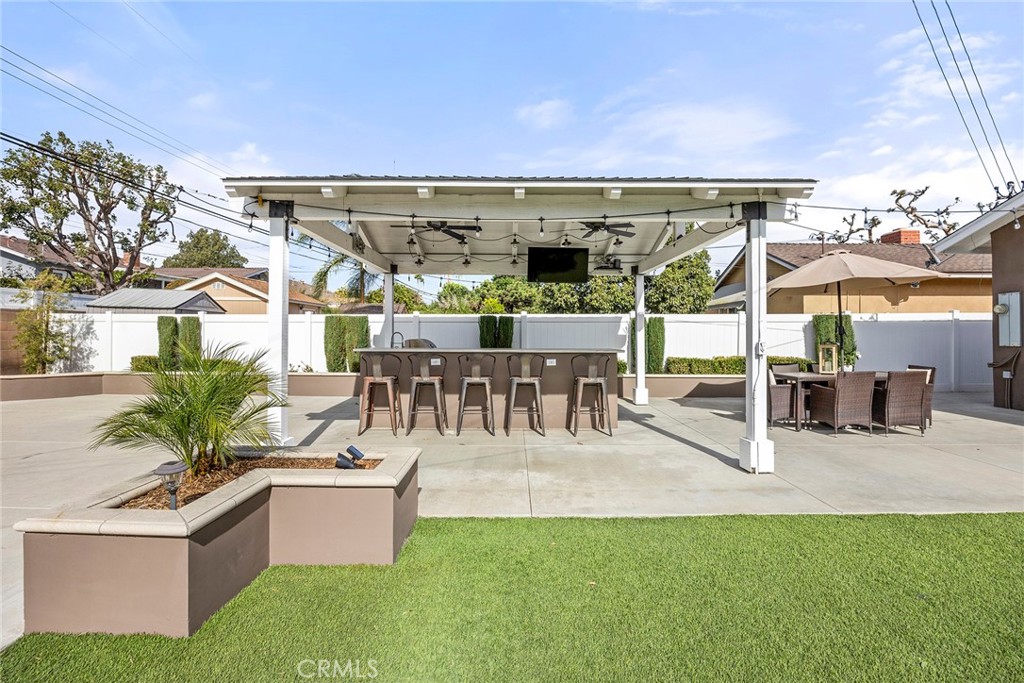 907 Chestnut Avenue Brea, CA 92821 - Photo 22 of 35 a view of a patio with dining table and chairs