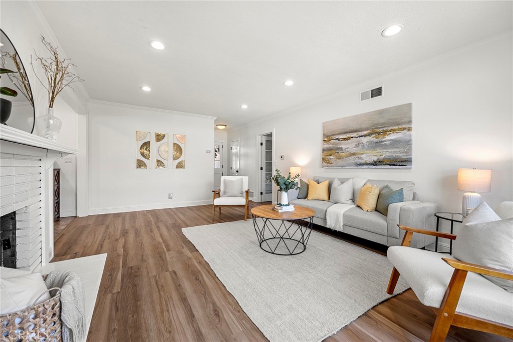 907 Chestnut Avenue Brea, CA 92821 - Photo 3 of 35 a living room with furniture and a wooden floor
