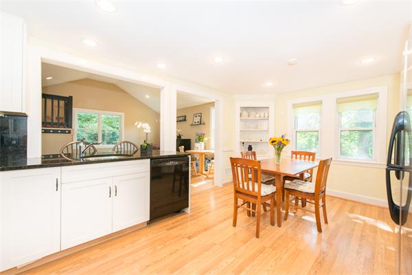 10 Briggs Road Lexington, MA 02421 - Photo 11 of 30 a view of a dining room with furniture and wooden floor