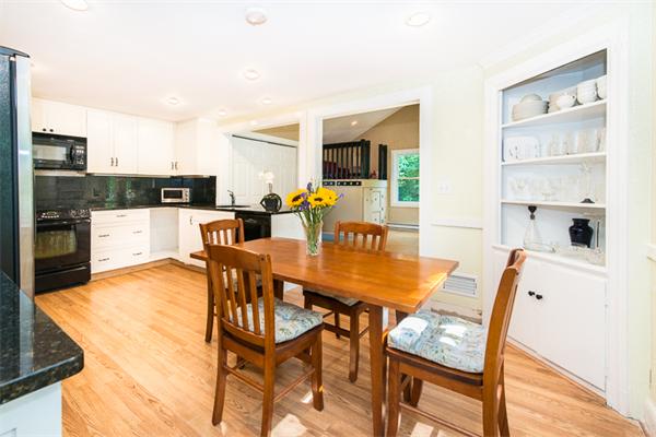 10 Briggs Road Lexington, MA 02421 - Photo 12 of 30 a view of a dining room with furniture and a kitchen