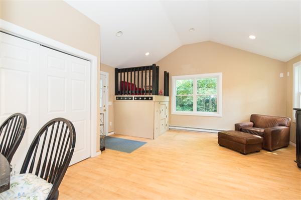10 Briggs Road Lexington, MA 02421 - Photo 15 of 30 a bedroom with furniture and a window