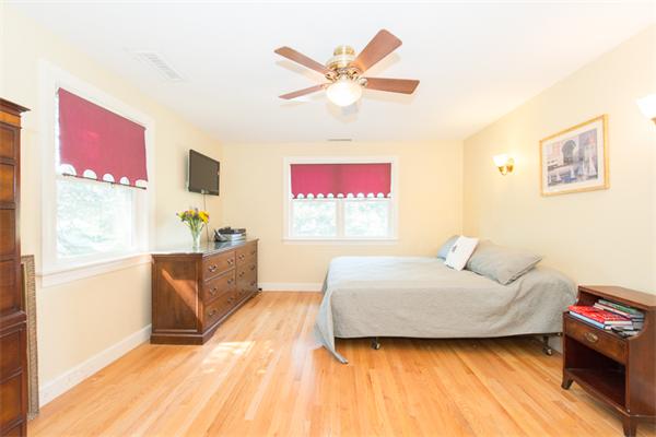 10 Briggs Road Lexington, MA 02421 - Photo 24 of 30 a living room with furniture and a window