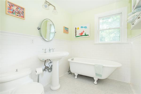 10 Briggs Road Lexington, MA 02421 - Photo 27 of 30 a bathroom with a sink and a mirror