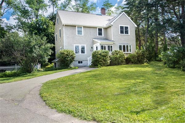 10 Briggs Road Lexington, MA 02421 - Photo 28 of 30 a view of a house with a yard