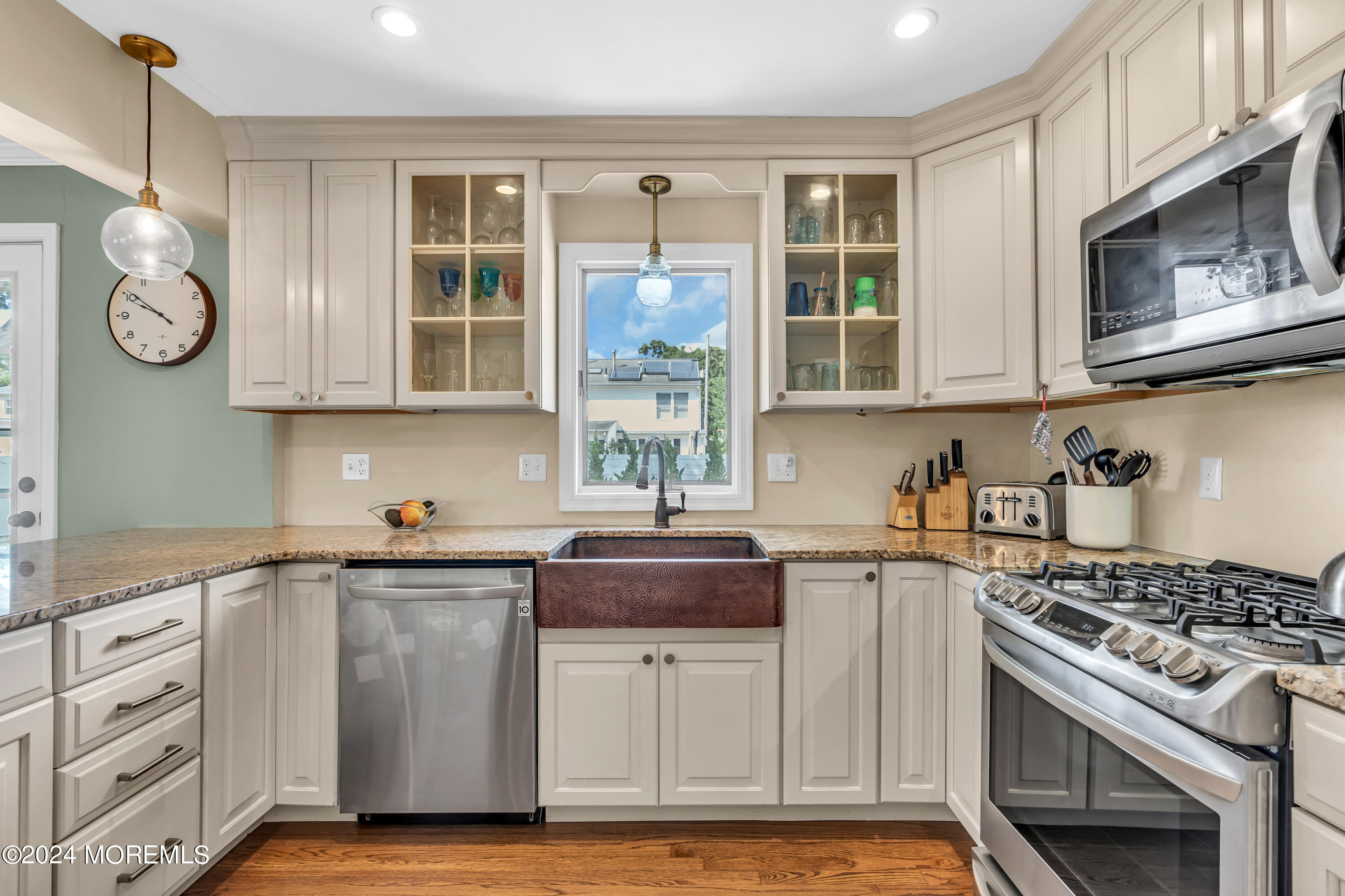 2217 Edgar Road Point Pleasant, NJ 08742 - Photo 20 of 46 a kitchen with cabinets appliances and a window