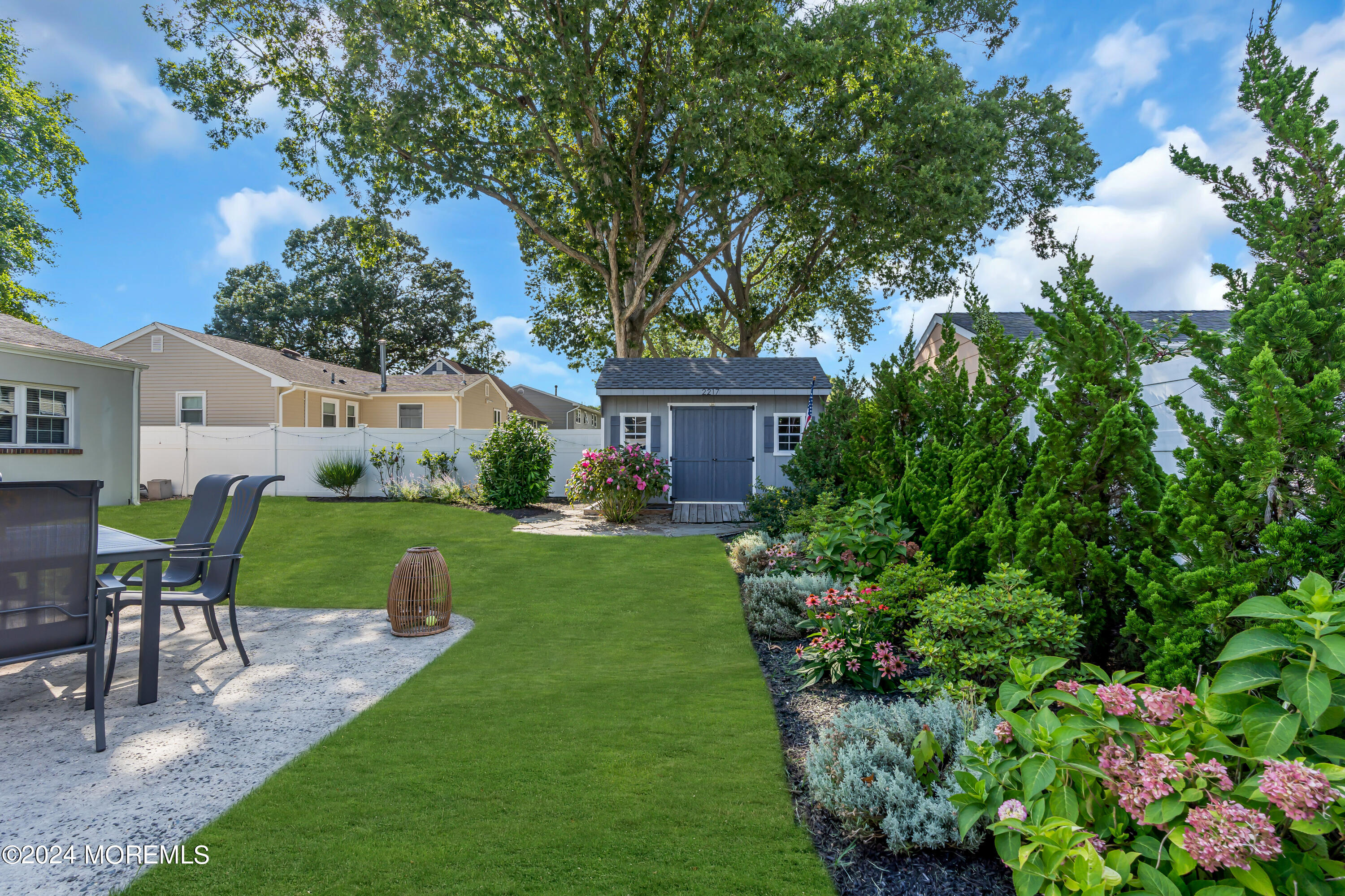 2217 Edgar Road Point Pleasant, NJ 08742 - Photo 42 of 46 a view of a house with a yard and sitting area