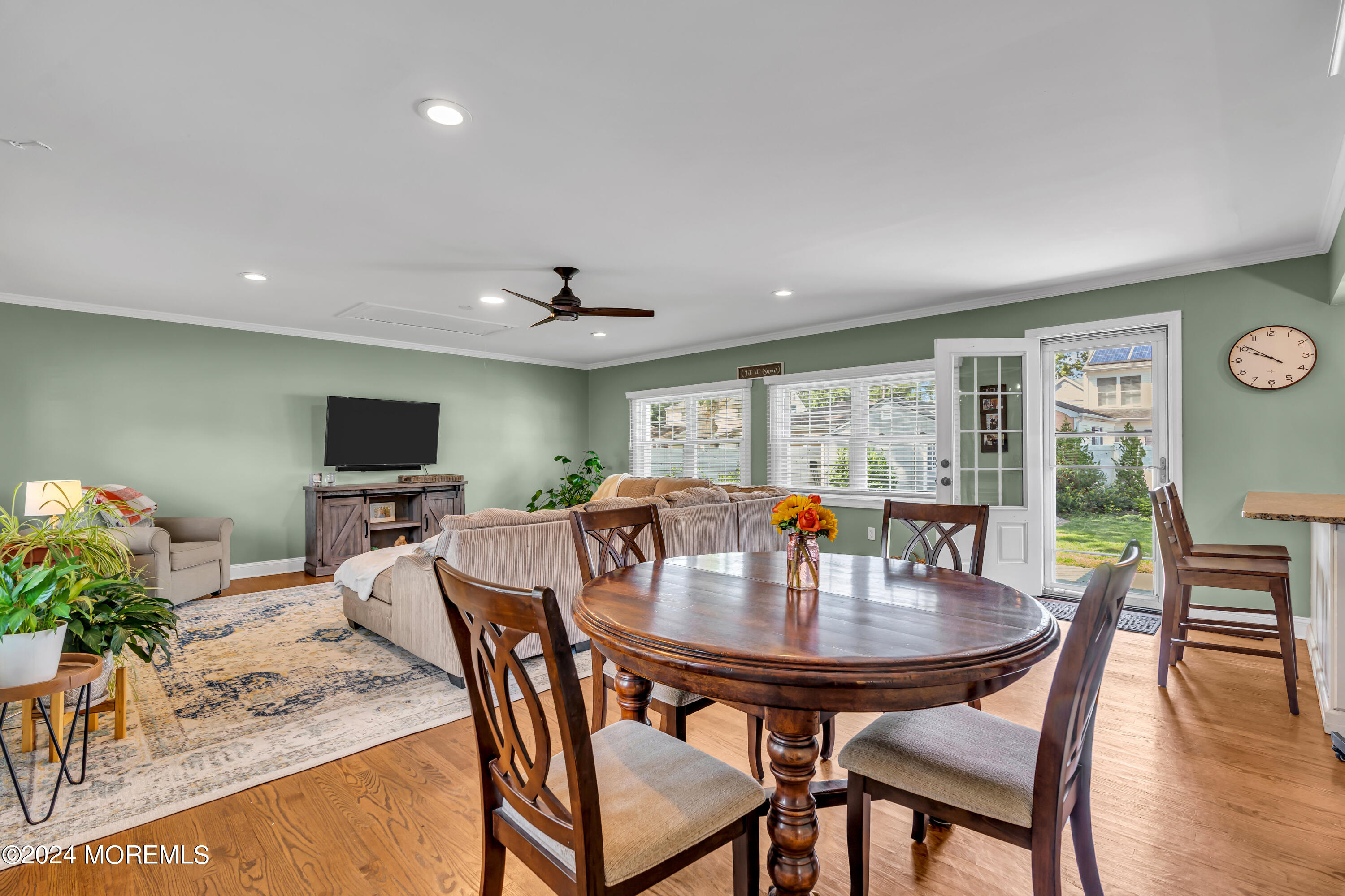 2217 Edgar Road Point Pleasant, NJ 08742 - Photo 8 of 46 a view of a dining room with furniture and wooden floor
