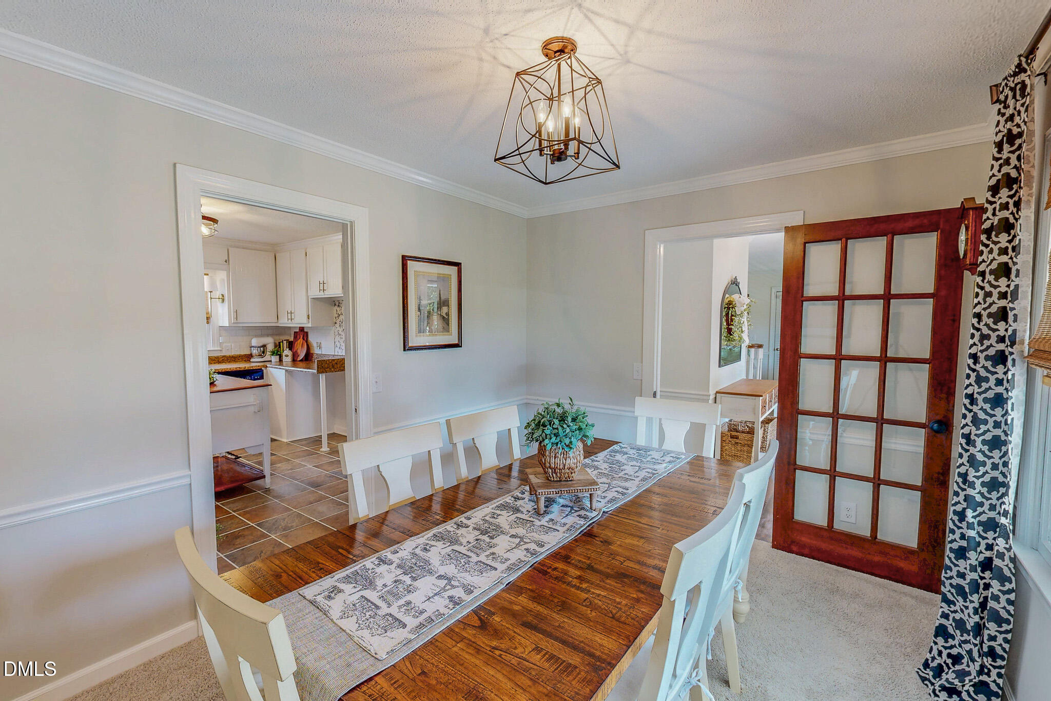 7810 Helena Moriah Road Rougemont, NC 27572 - Photo 13 of 53 a living room with furniture and a chandelier