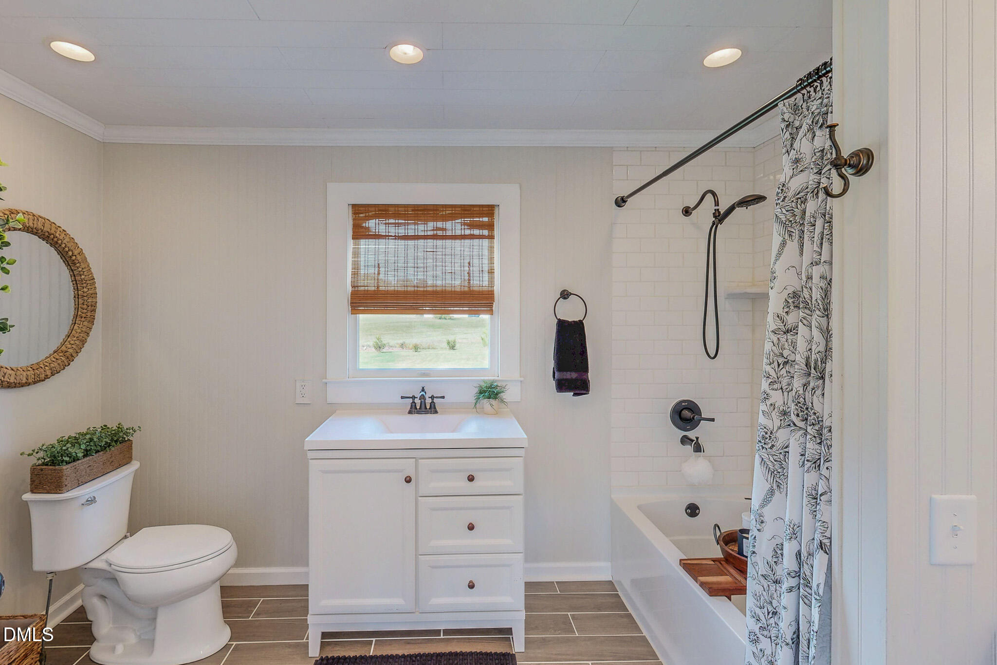 7810 Helena Moriah Road Rougemont, NC 27572 - Photo 18 of 53 a bathroom with a sink toilet and shower