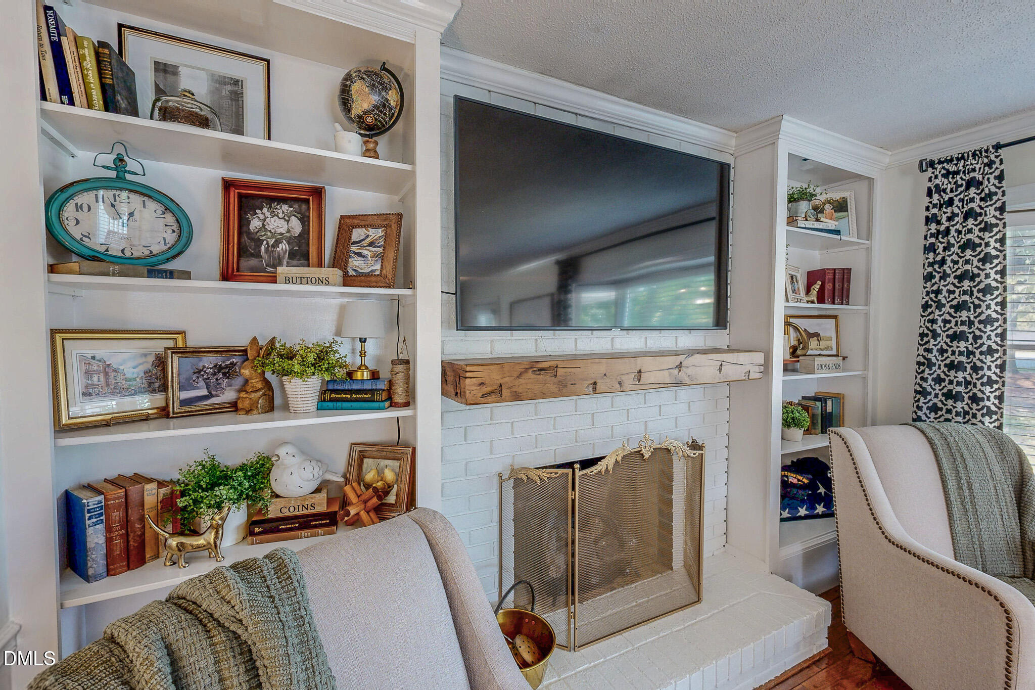 7810 Helena Moriah Road Rougemont, NC 27572 - Photo 23 of 53 a living room with furniture and a fireplace