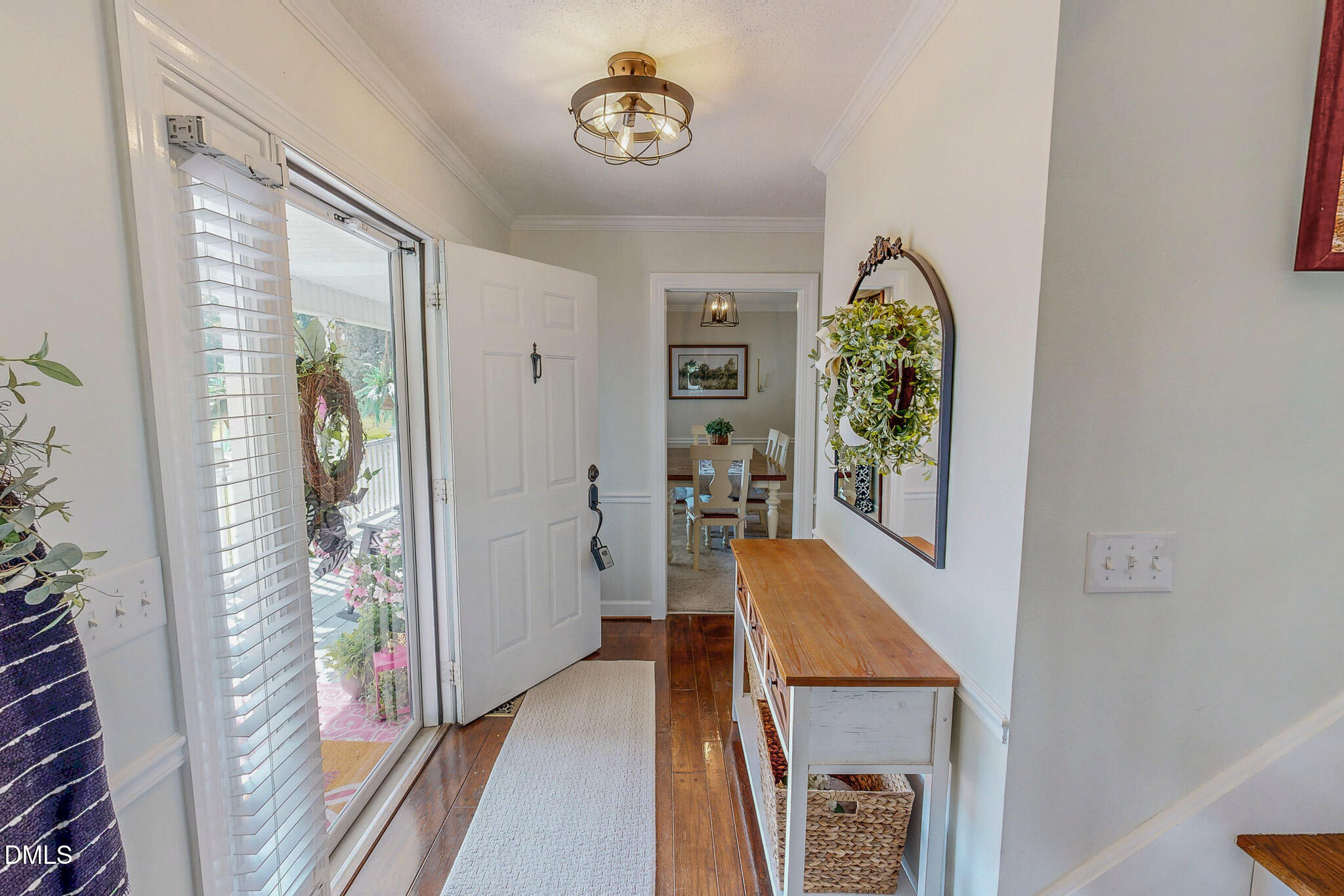7810 Helena Moriah Road Rougemont, NC 27572 - Photo 25 of 53 a view of a hallway with furniture and a livingroom