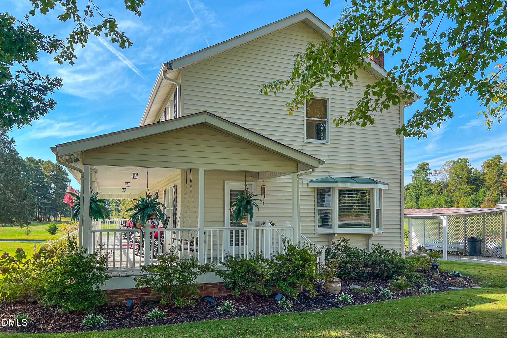 7810 Helena Moriah Road Rougemont, NC 27572 - Photo 29 of 53 a view of a house with potted plants and a yard