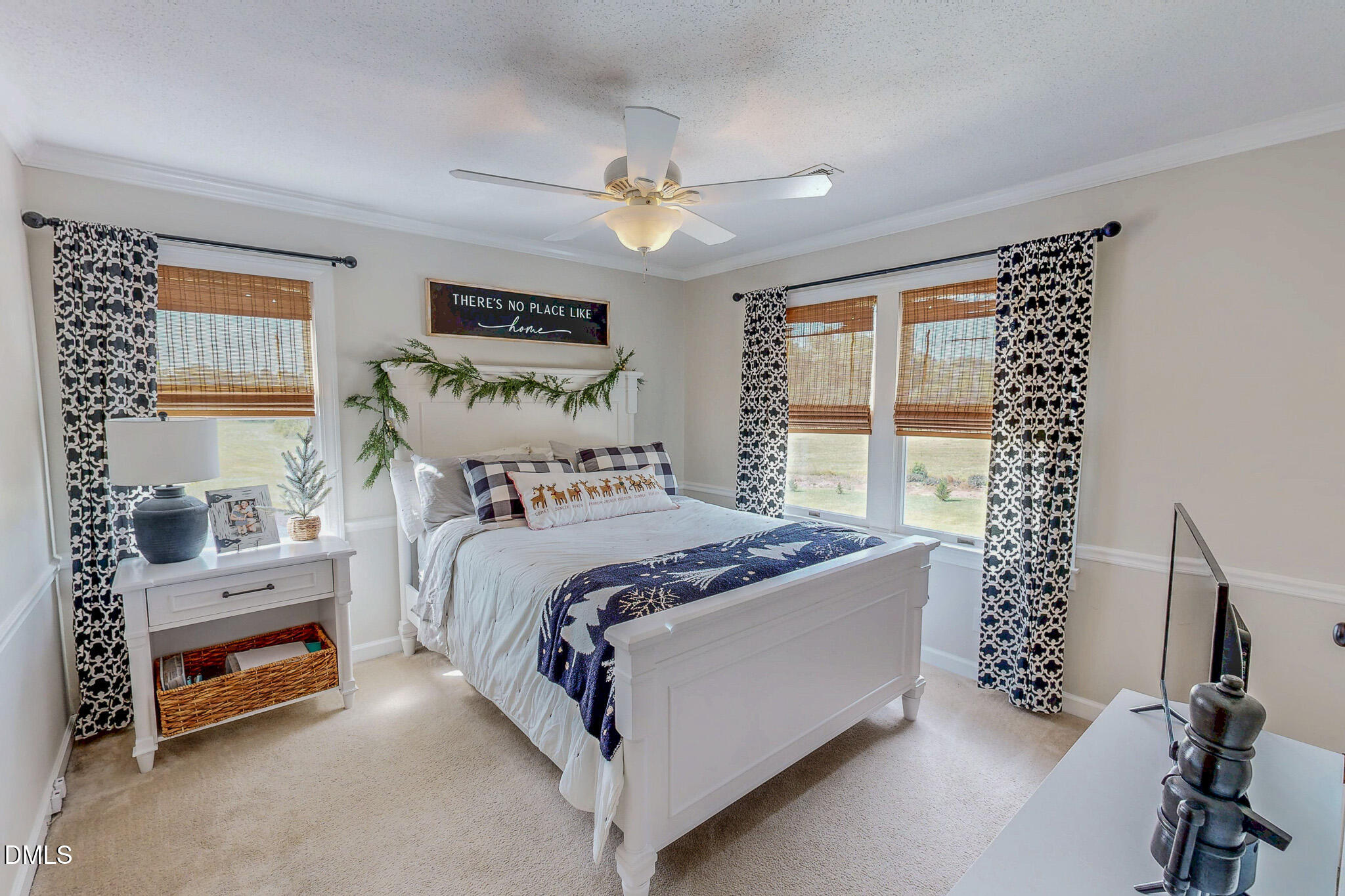 7810 Helena Moriah Road Rougemont, NC 27572 - Photo 39 of 53 a bed sitting in a bedroom next to a window