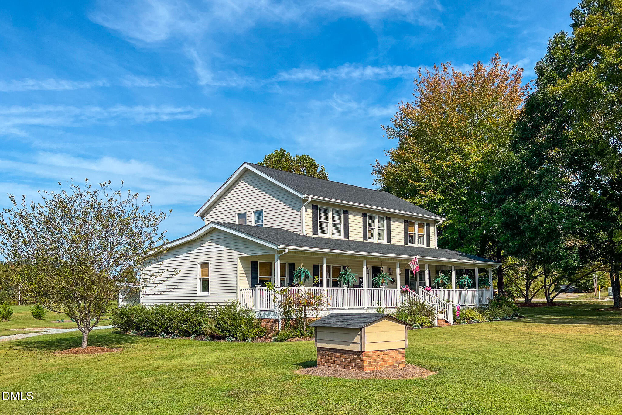 7810 Helena Moriah Road Rougemont, NC 27572 - Photo 46 of 53 a front view of a house with garden