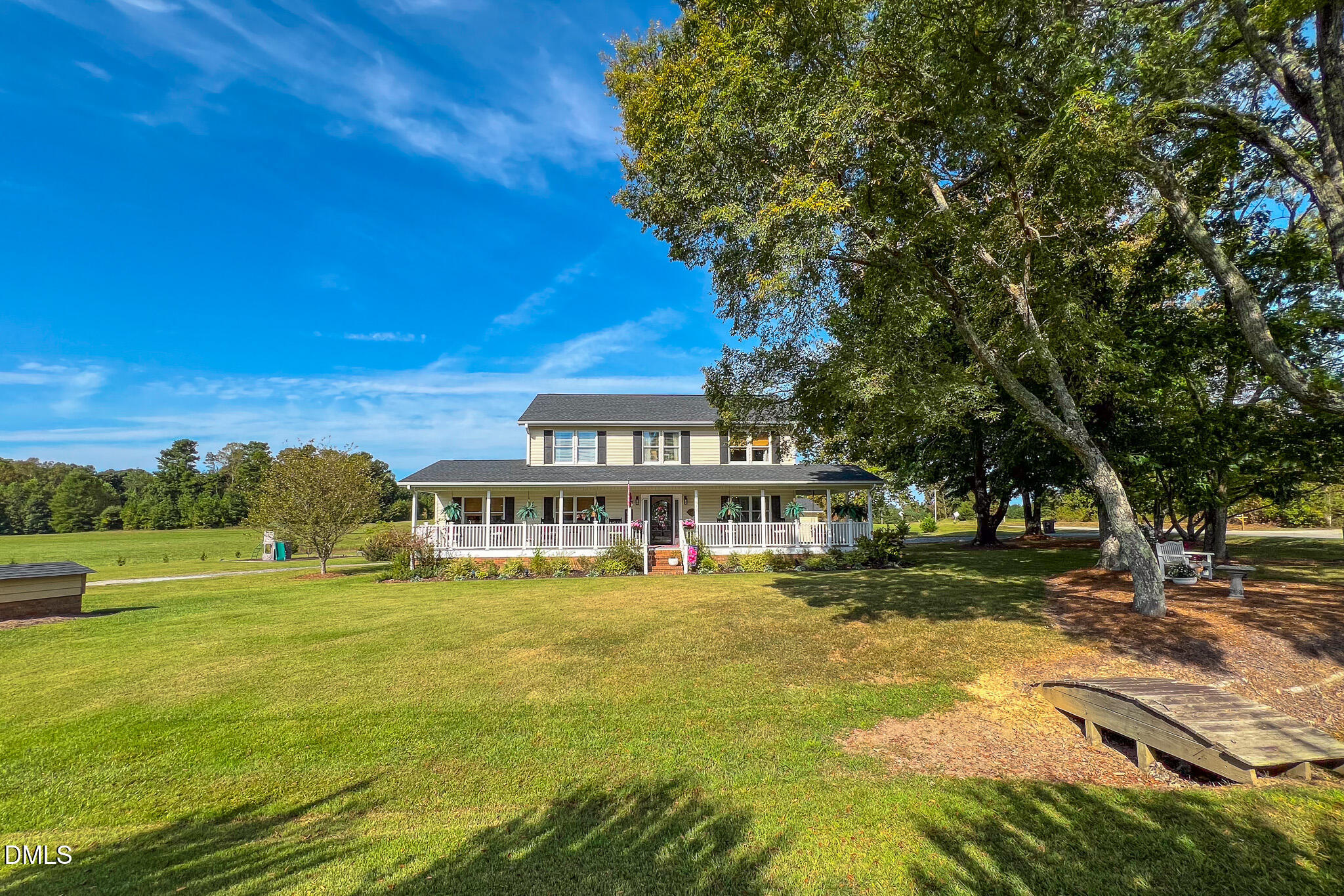7810 Helena Moriah Road Rougemont, NC 27572 - Photo 49 of 53 a view of an ocean with a house in the background