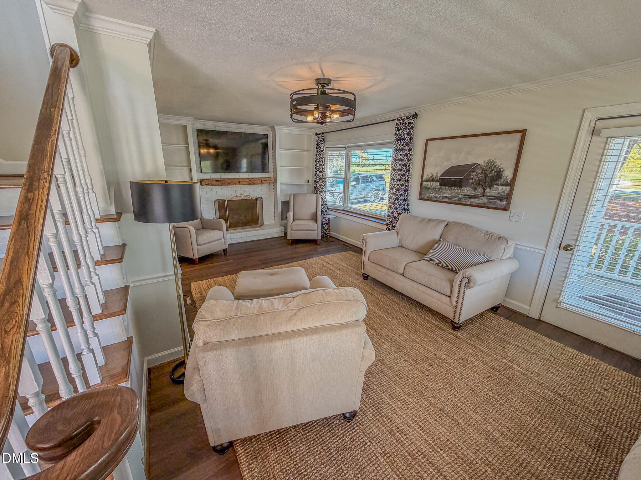 7810 Helena Moriah Road Rougemont, NC 27572 - Photo 50 of 53 a living room with furniture and a fireplace