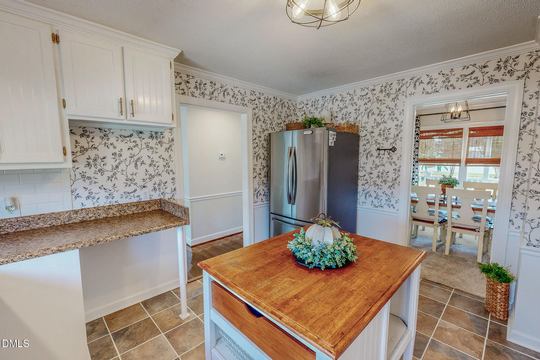 7810 Helena Moriah Road Rougemont, NC 27572 - Photo 10 of 53 a kitchen with stainless steel appliances granite countertop a sink and a refrigerator