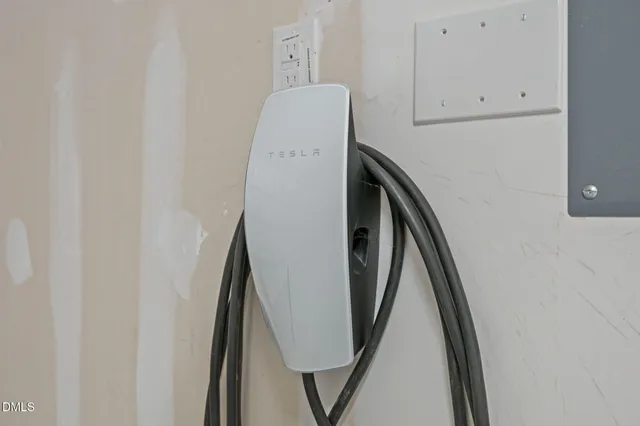 a view of closet with wooden floor