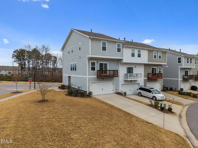 a swimming pool with outdoor seating and yard
