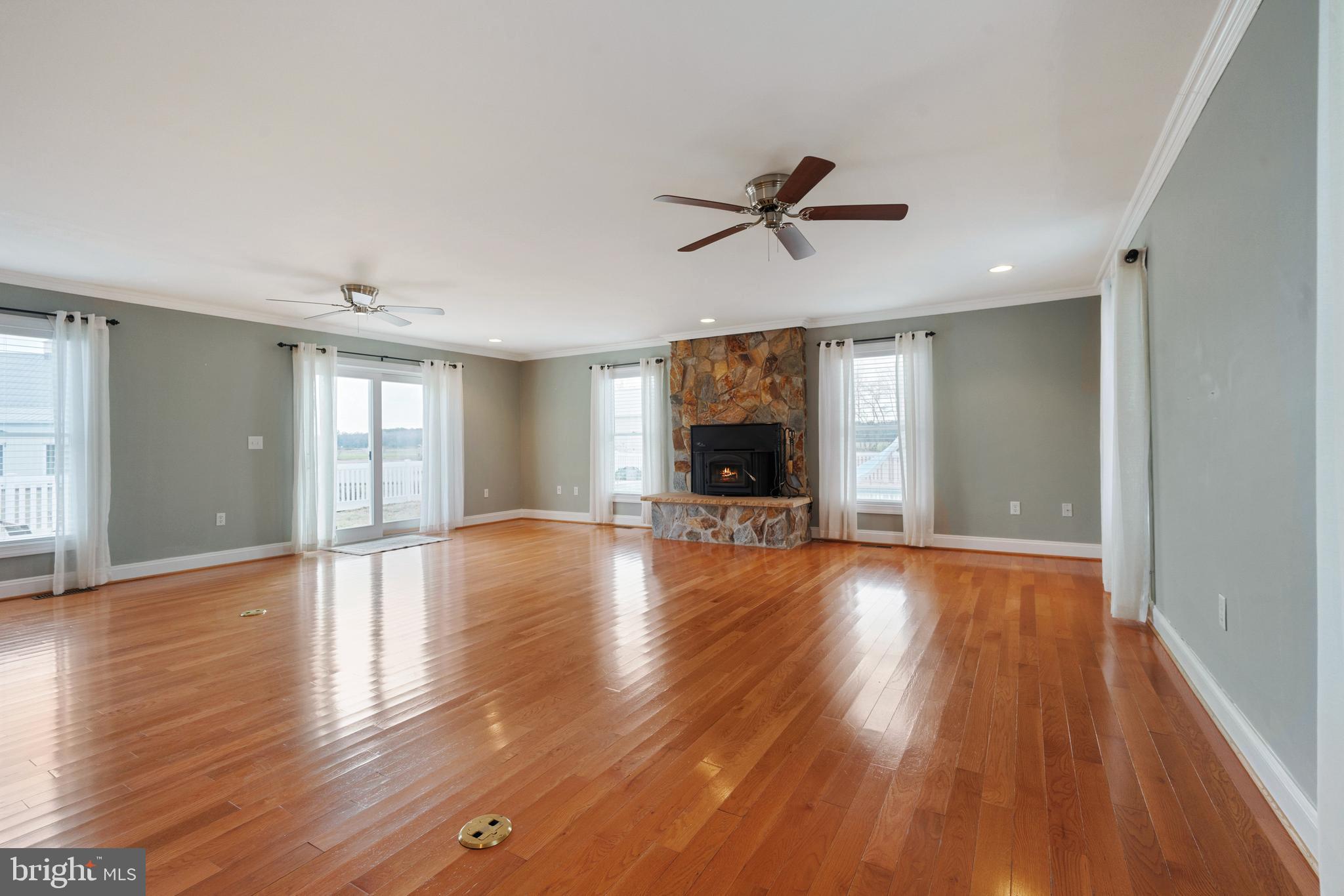 24461 Friendship Road Preston, MD 21655 - Photo 19 of 60 Beautiful family room with a wood stove