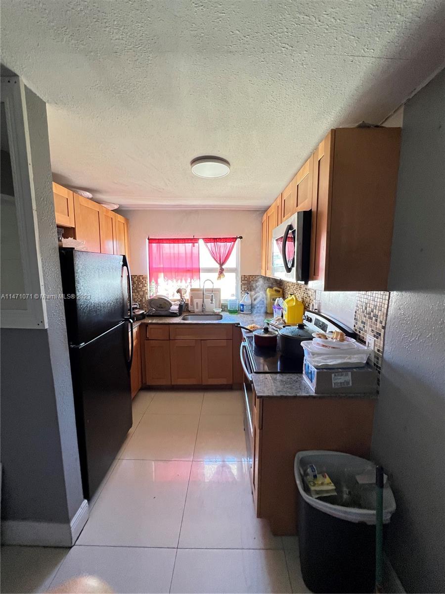 2223 Northwest 32nd Street Miami, FL 33142 - Photo 13 of 38