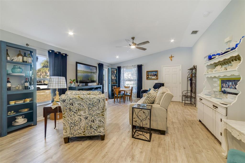 1239 St Anne Shrine Road Lake Wales, FL 33898 - Photo 3 of 27 a living room with furniture and a flat screen tv