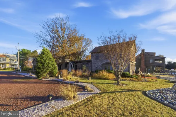 a view of a swimming pool with a house