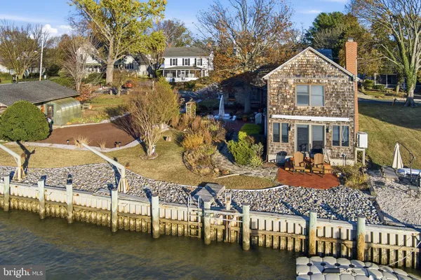 a front view of a house with lake view