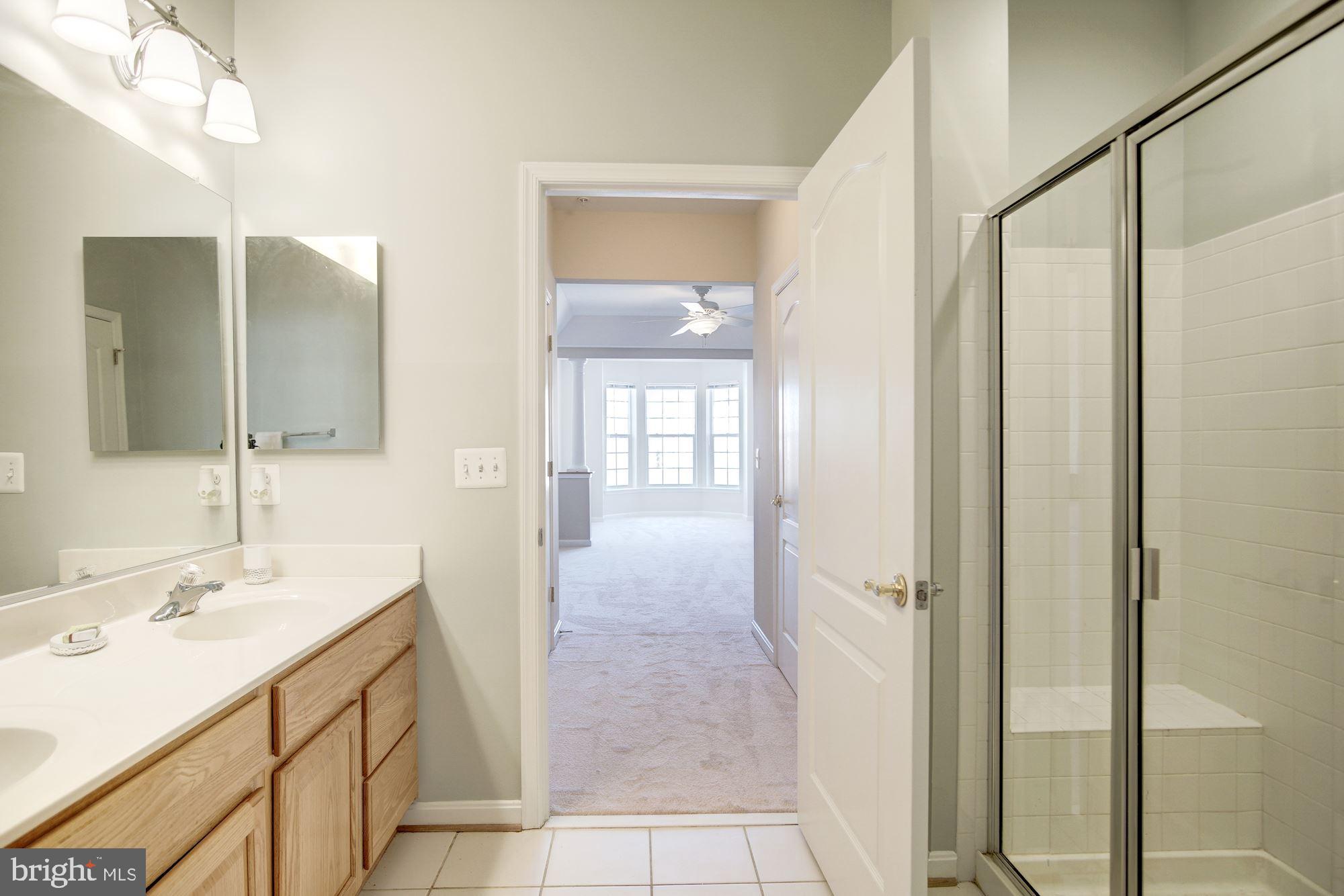 7325 Brookview Road, Unit 308 Elkridge, MD 21075 - Photo 21 of 31 Glass shower doors