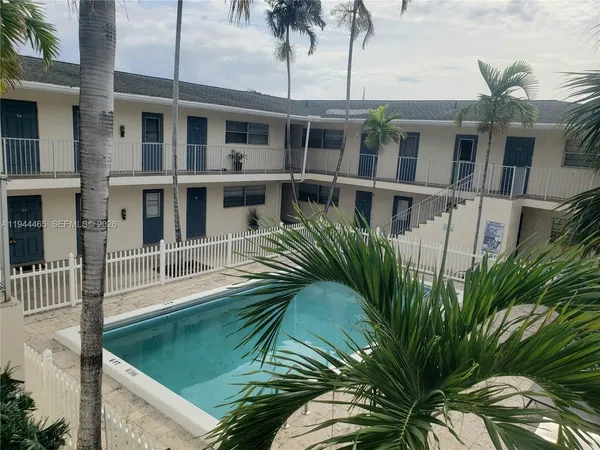 a view of a yard in front of a building