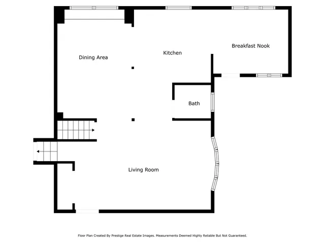 a picture of a bench in room with a window