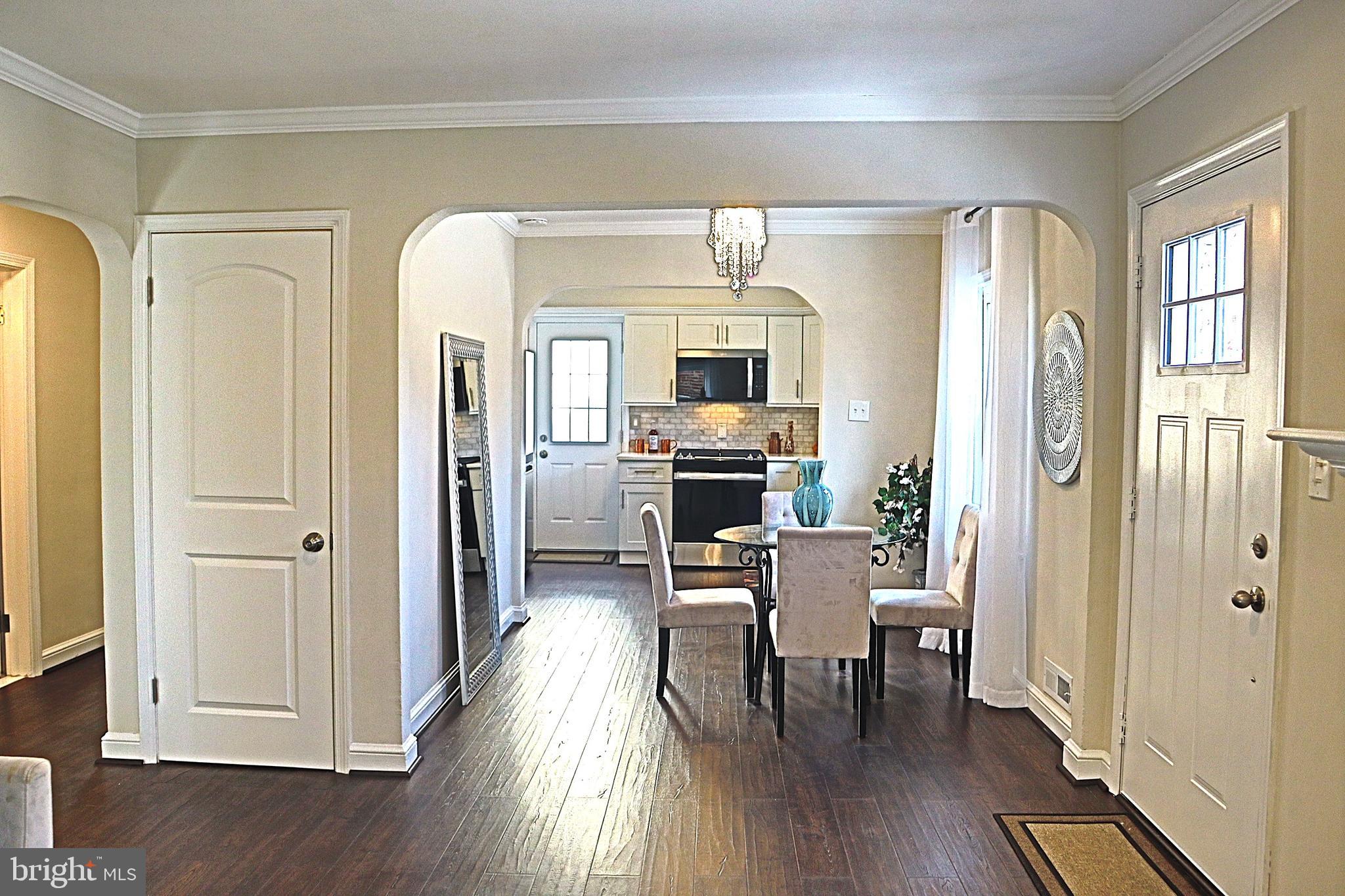 10110 Dallas Avenue Silver Spring, MD 20901 - Photo 11 of 54 Living room open to dining and kitchen