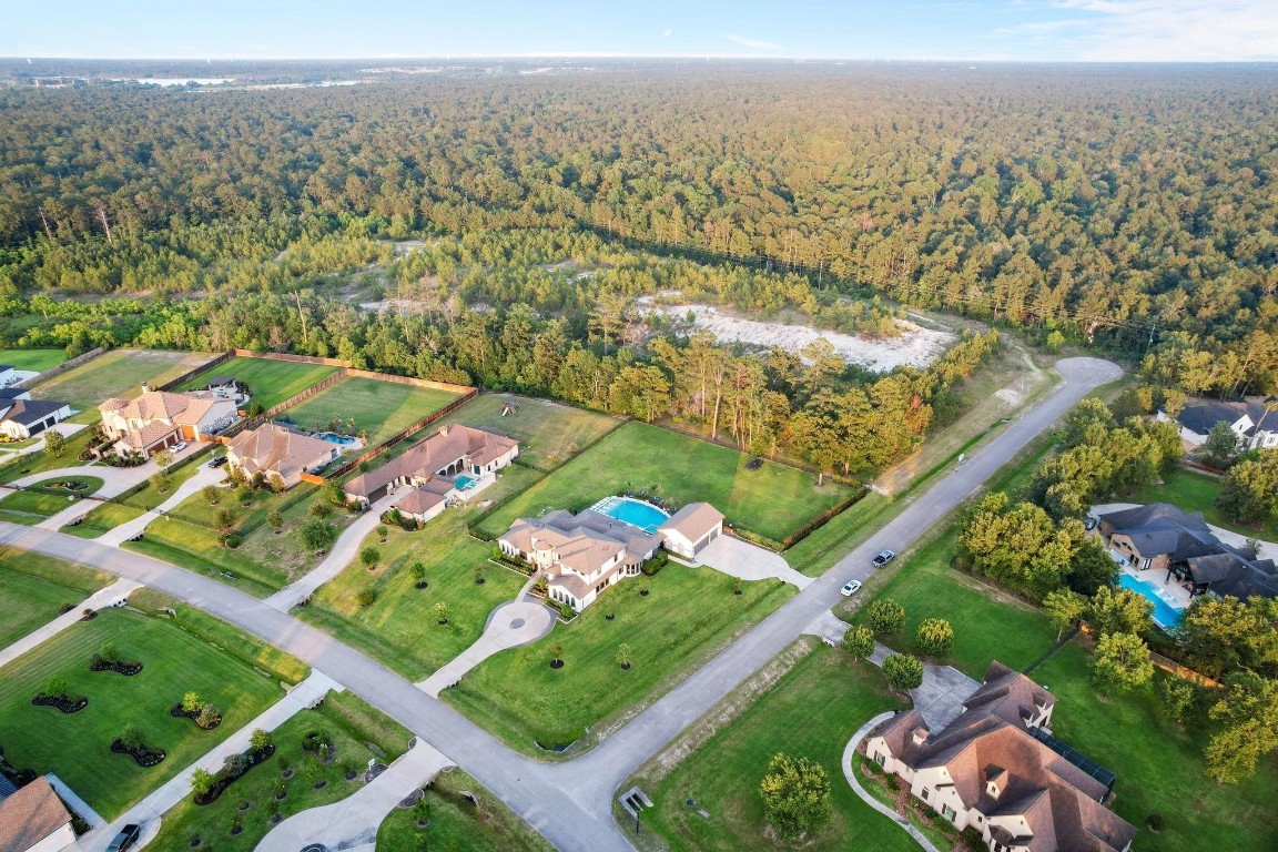 27494 South Lazy Meadow Way Spring, TX 77386 - Photo 4 of 49 an aerial view of residential houses with outdoor space